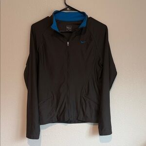 Nike Women's Utility Jacket in Dark Grey with Blue Highlights